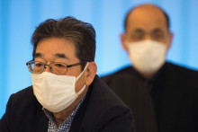 Des passagers masqués à la suite du coronavirus