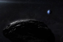 Un astéroïde avec la Terre en arrière-plan