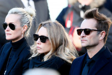 Laetiticia Hallyday, Laura Smet, David Hallyday lors de l'hommage national à Johnny le 9 décembre 2017