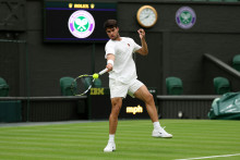 Carlos Alcaraz à l'entraînement à Wimbledon le 26 juin 2025