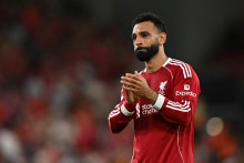 Liverpool's Egyptian striker #11 Mohamed Salah applauds fans after the English Premier League football match between Liverpool and Bournemouth at Anfield in Liverpool, north west England on August 15, 2025. Liverpool won the game 4-2. Paul ELLIS / AFP
