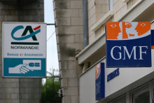 Les logos du Crédit Agricole et de la GMF (image d'illustration)