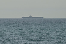 1830268-un-navire-dans-le-detroit-d-ormuz-le-13-avril-2024-vu-depuis-le-port-emirati-de-ras-al-khaimah