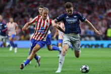 Marcos Llorente et Viktor Gyökeres lors du match aller de la demi-finale de Ligue des champions entre l'Atlético et Arsenal, au Metropolitano de Madrid, le 29 avril 2026.