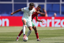 Désiré Doué et Azzedine Ounahi lors de France-Maroc en quarts de finale de la Coupe du monde, le 9 juillet 2026 à Boston.