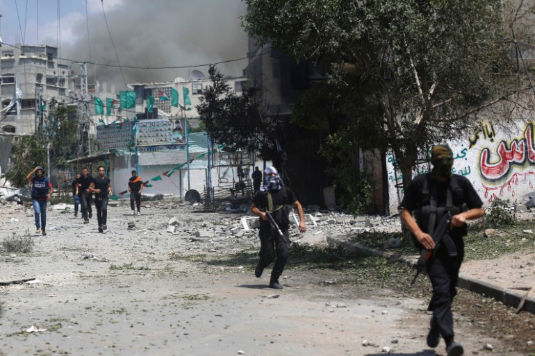 Des combattants du Hamas dans le quartier de Chajaya, à Gaza, le 20 juillet 2014