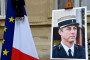 Le portrait d'Arnaud Beltrame, exposé au ministère de l'Intérieur à Paris, lors de la cérémonie nationale le 28 mars 2018.