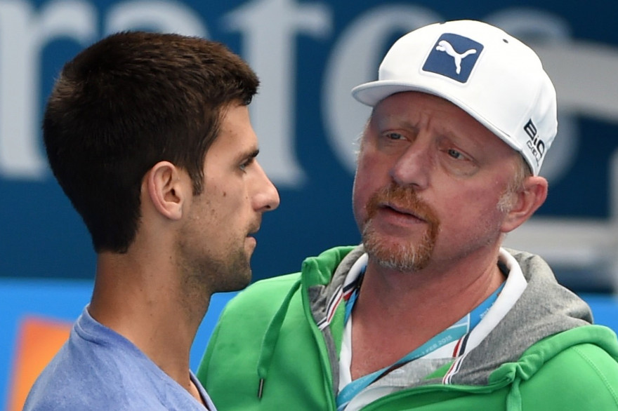 Depuis décembre 2013, l'ancien N.1 mondial allemand Boris Becker entraîne Noval Djokovic (ici le 31 janvier 2015 à l'Open d'Australie, remporté par Novak Djokovic)