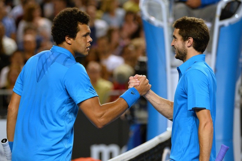 Jo-Wilfried Tsonga et Gilles Simon à l'Open d'Australie, le 18 janvier 2014