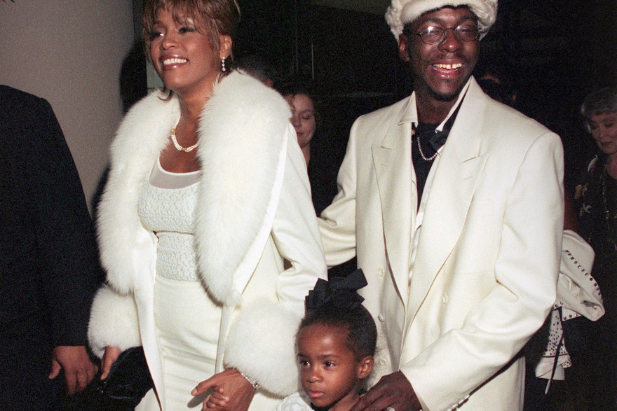Whitney Houston et Bobby Brown, avec leur fille Bobbi Kristina, en 1998.