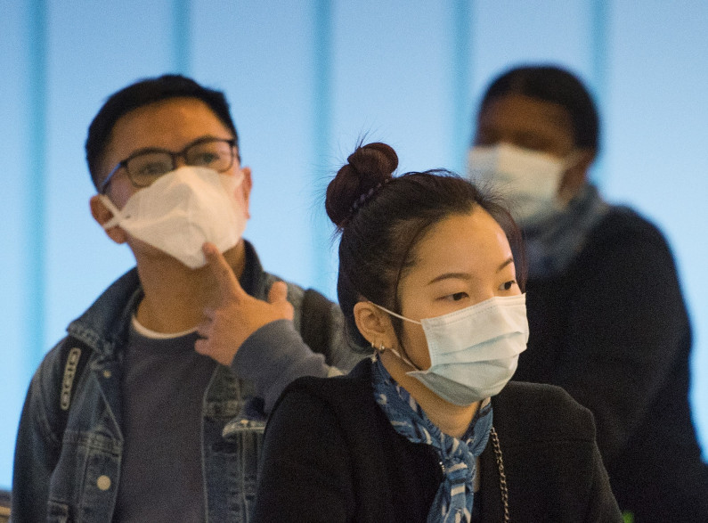 Des personnes masquées lors de l'épidémie du coronavirus (illustration)