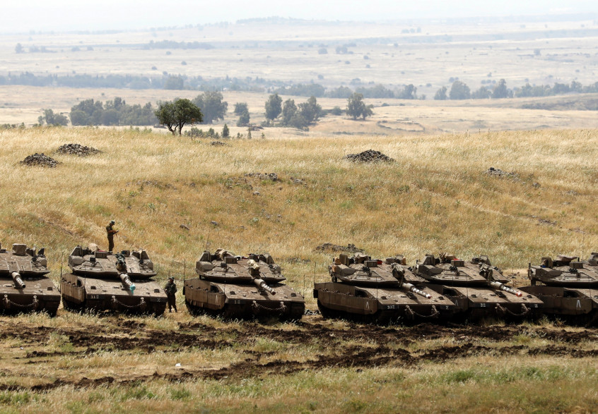 Des tanks israéliens postés à proximité de la frontière syrienne, sur le plateau du Golan annexé par Israël, jeudi 10 mai 2018 (illustration)