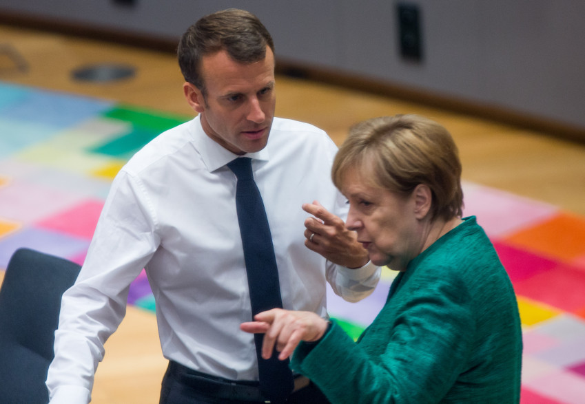 Emmanuel Macron et Angela Merkel lors du sommet de l'Union européenne sur la crise migratoire à Bruxelles le 28 juin 2018.